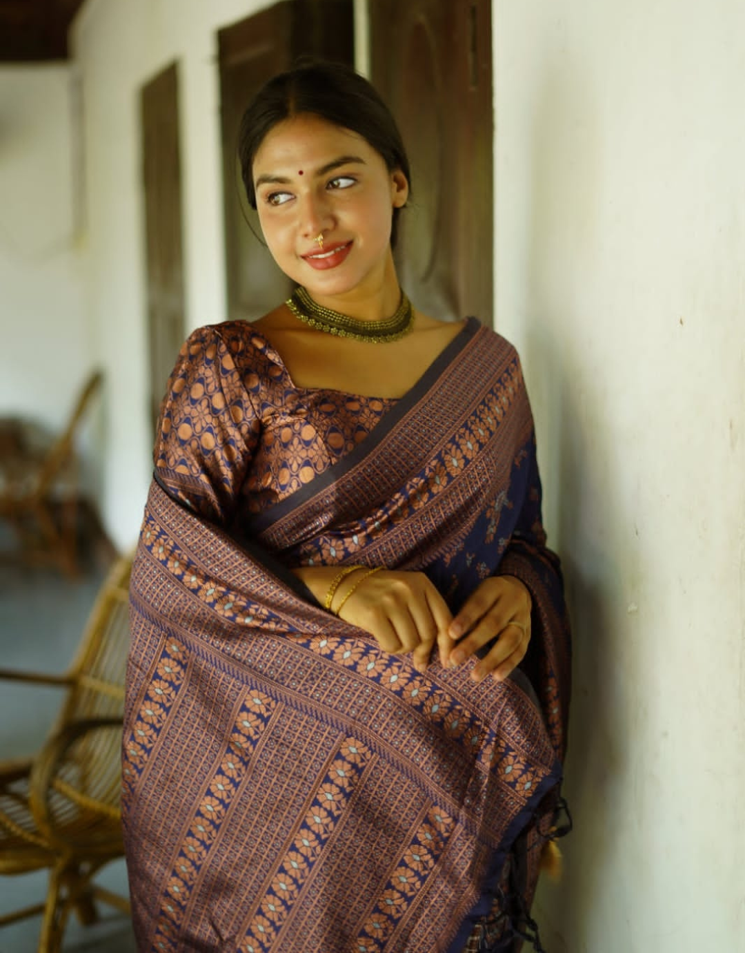 Indian Model wearing traditional Maharashtrian saree, necklace, nose ring  and bangles, bridal wear and looking at camera Stock Photo - Alamy
